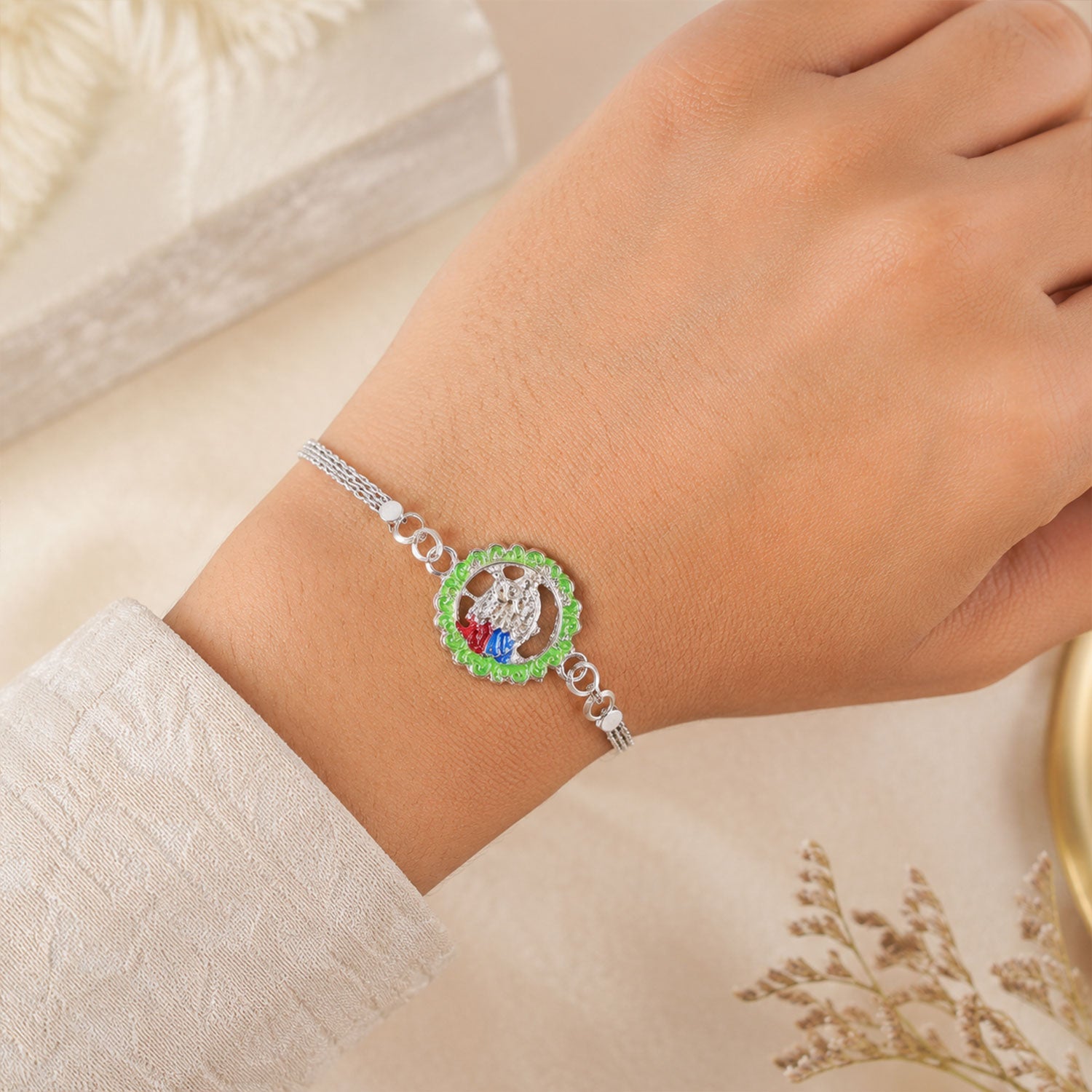 Radha Krishna Rakhi – Elegant Silver Chain Design