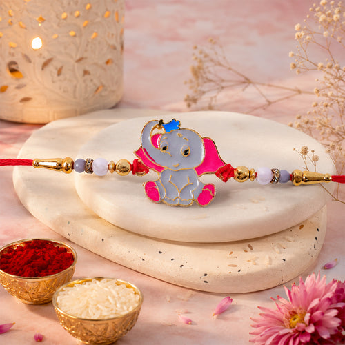 Close up of an Elephant Kids Rakhi with a detailed elephant motif and colourful beaded thread.