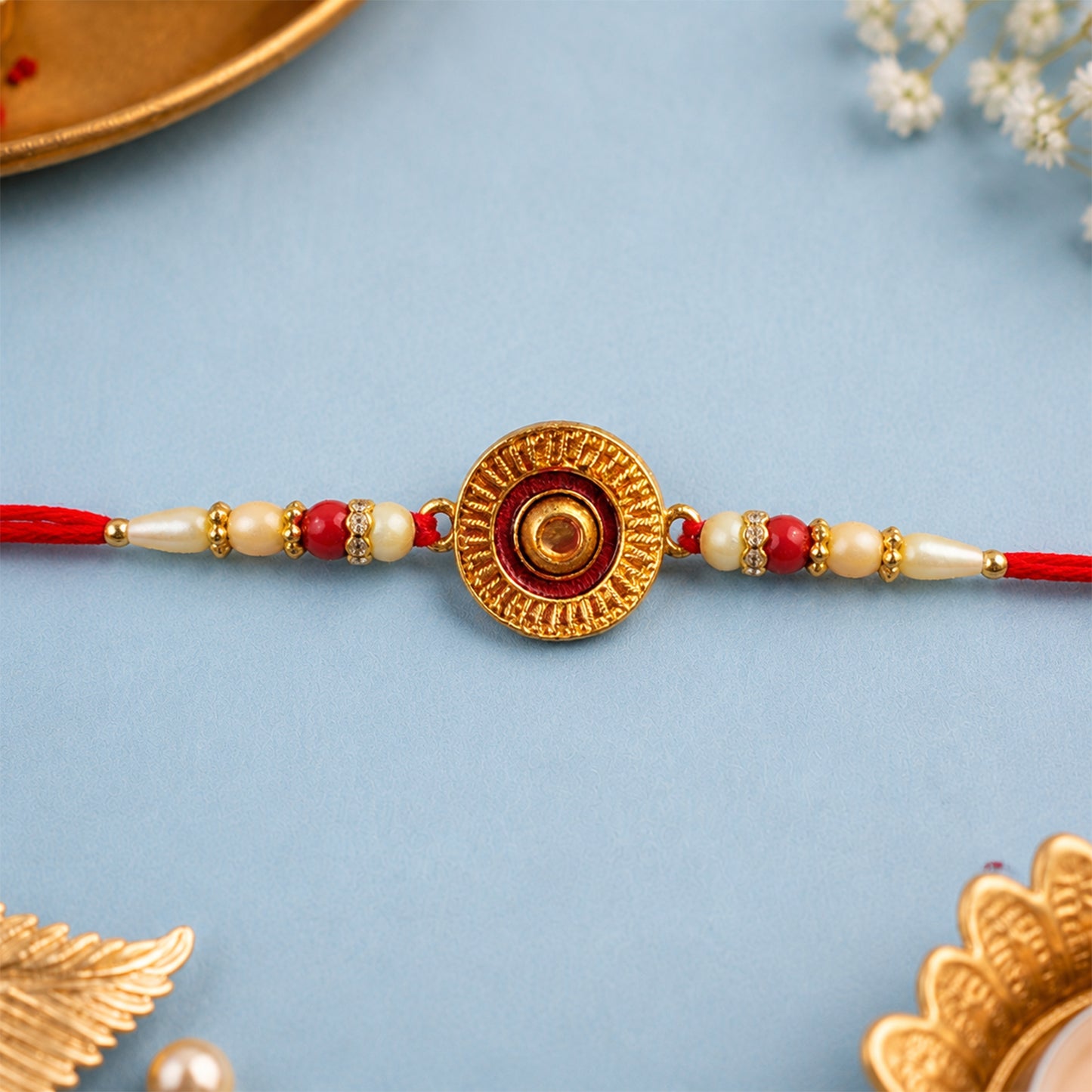Traditional Round Rakhi with Pearl Beads for Rakshabandhan