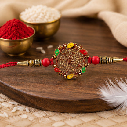Circular Rakhi with Multicolor Accents – Elegant Raksha Bandhan Gift