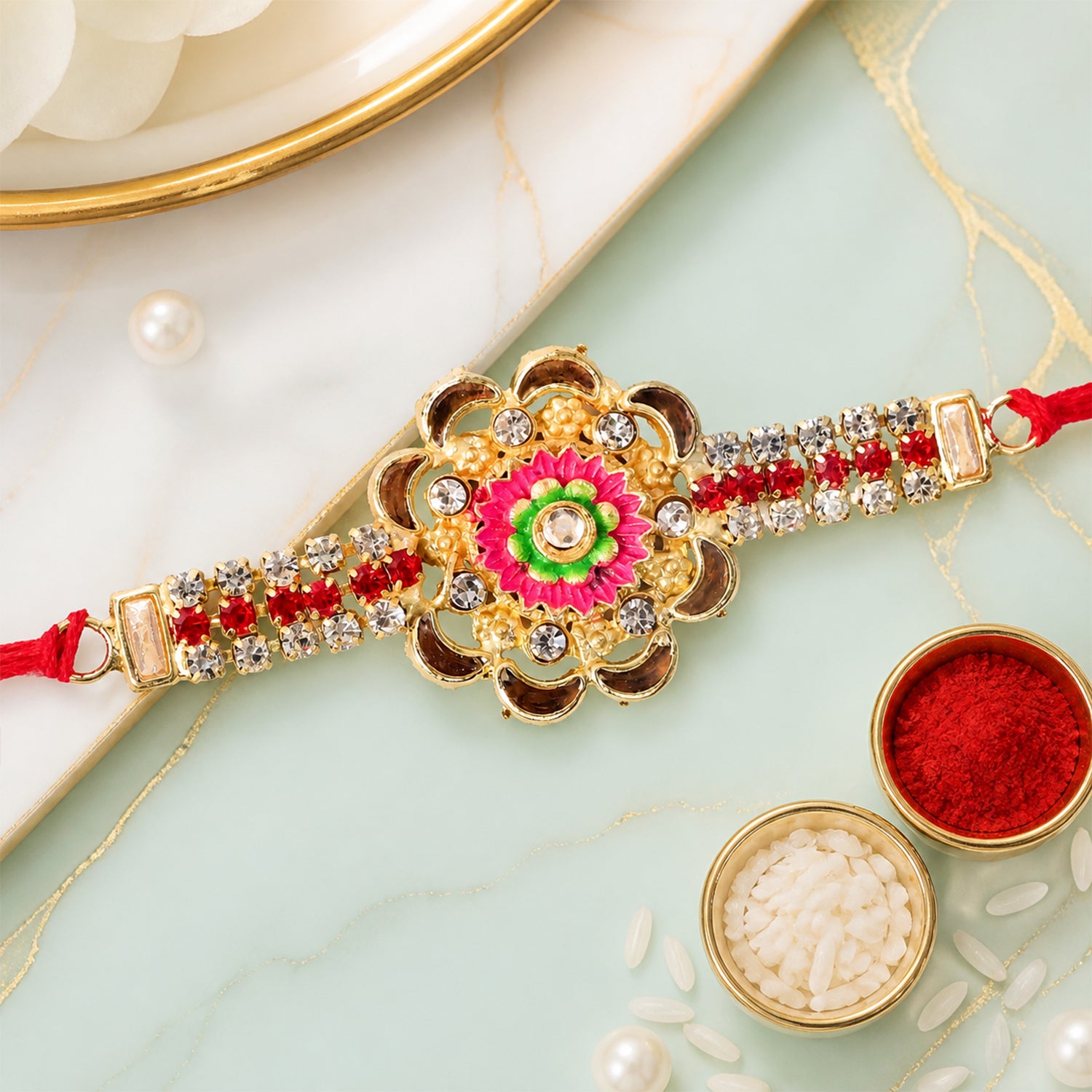 Diamond Rakhi – Stone Studded Floral Design with Colorful Enamel