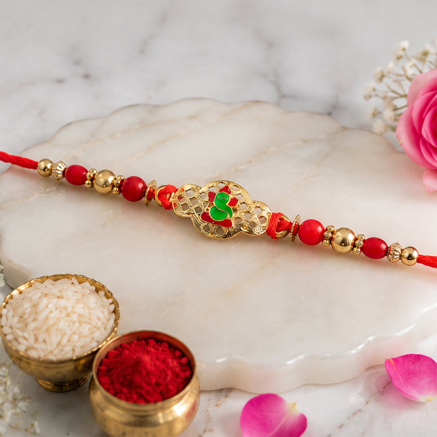 Ganesha Rakhi – Elegant Gold Finish for Raksha Bandhan