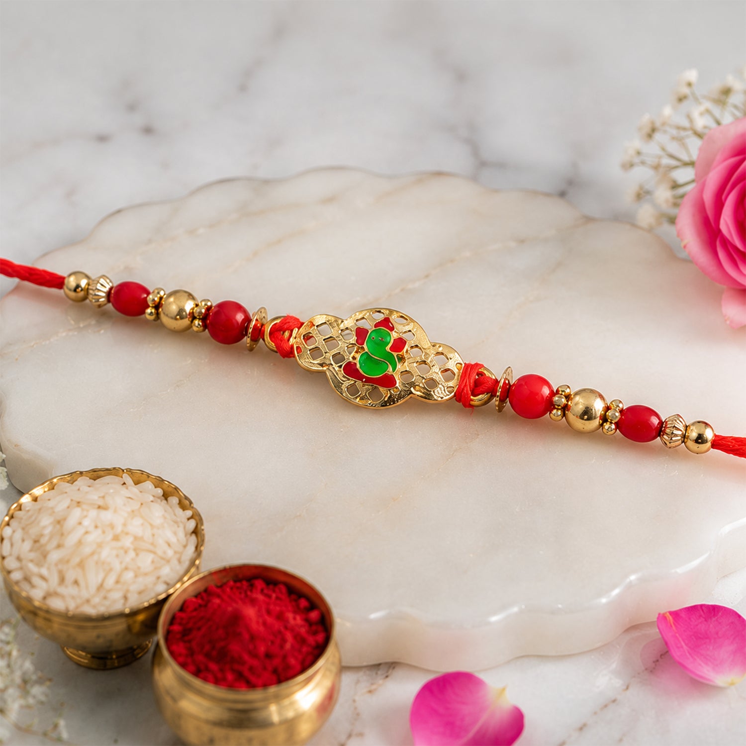 Ganesha Rakhi – Elegant Gold Finish for Raksha Bandhan