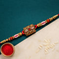 Antique Gold Kundan Studded Square Pendant Rakhi with Rudraksha Beads
