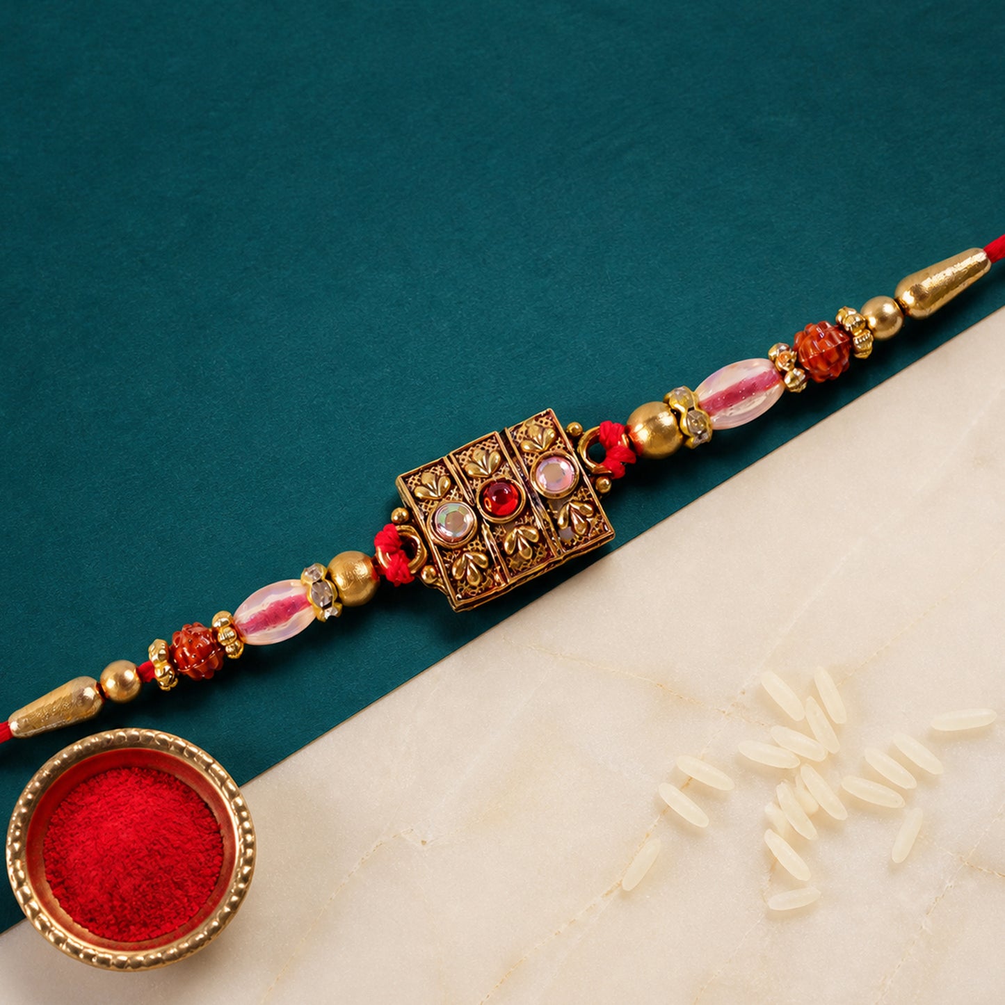Antique Gold Kundan Studded Square Pendant Rakhi with Rudraksha Beads