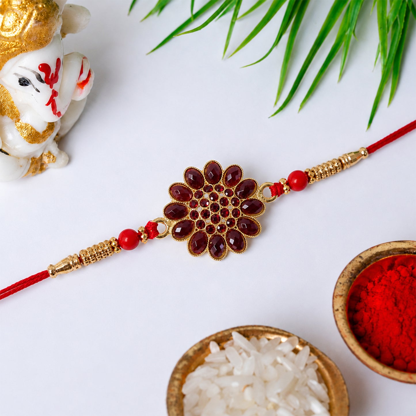 Red Floral Stone Rakhi – Elegant Bead Accents for Raksha Bandhan