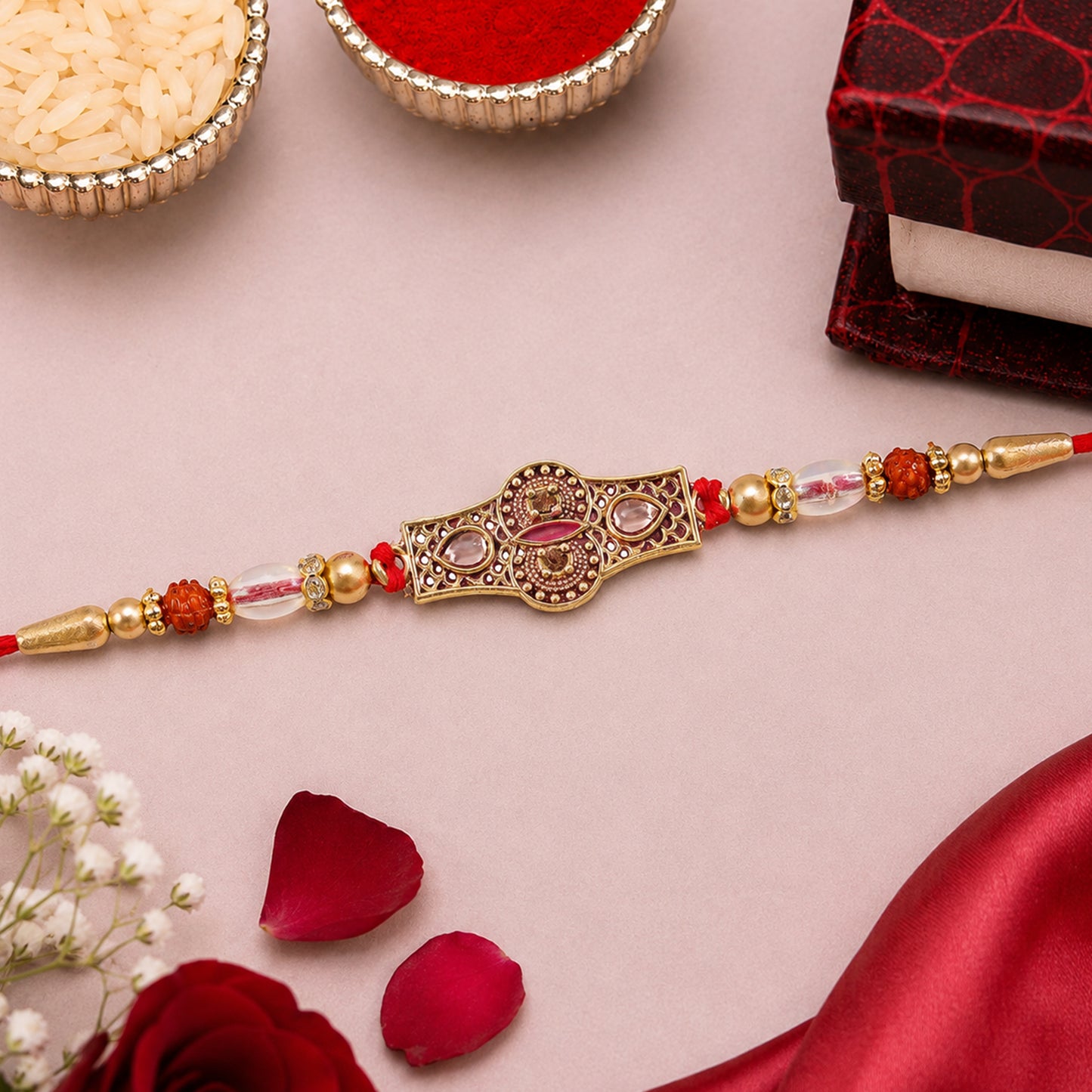 Rose Pink Kundan Stone Pendant Rakhi with Rudraksha and Coral Beads