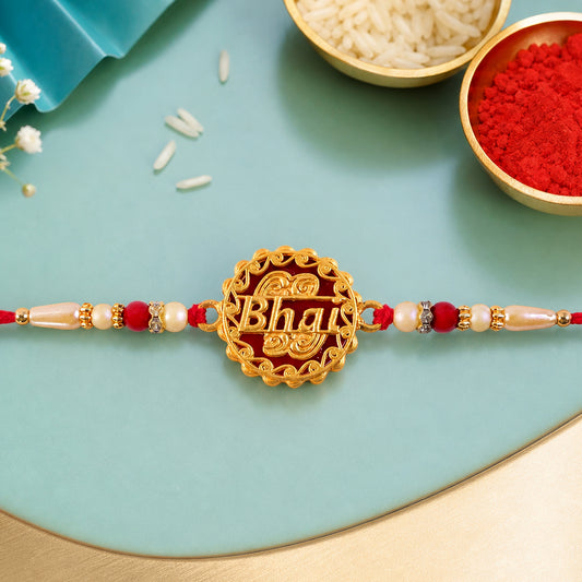 Swastik Rakhi – Golden Design with Red Beads & Thread