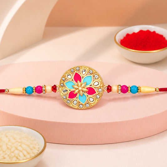 Floral Rakhi with Pink Blue Enamel – Elegant Festive Thread