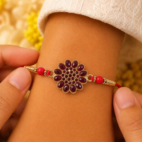 Red Floral Stone Rakhi with Bead Accents for Raksha Bandhan