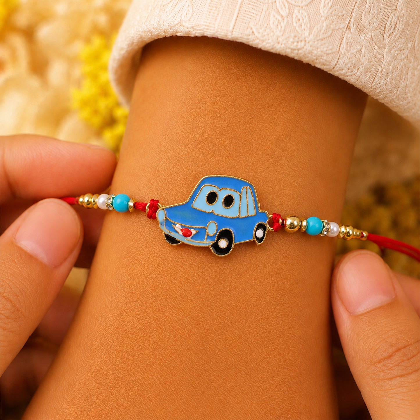 Kids Car Rakhi – Playful Design with Red Thread for Brothers