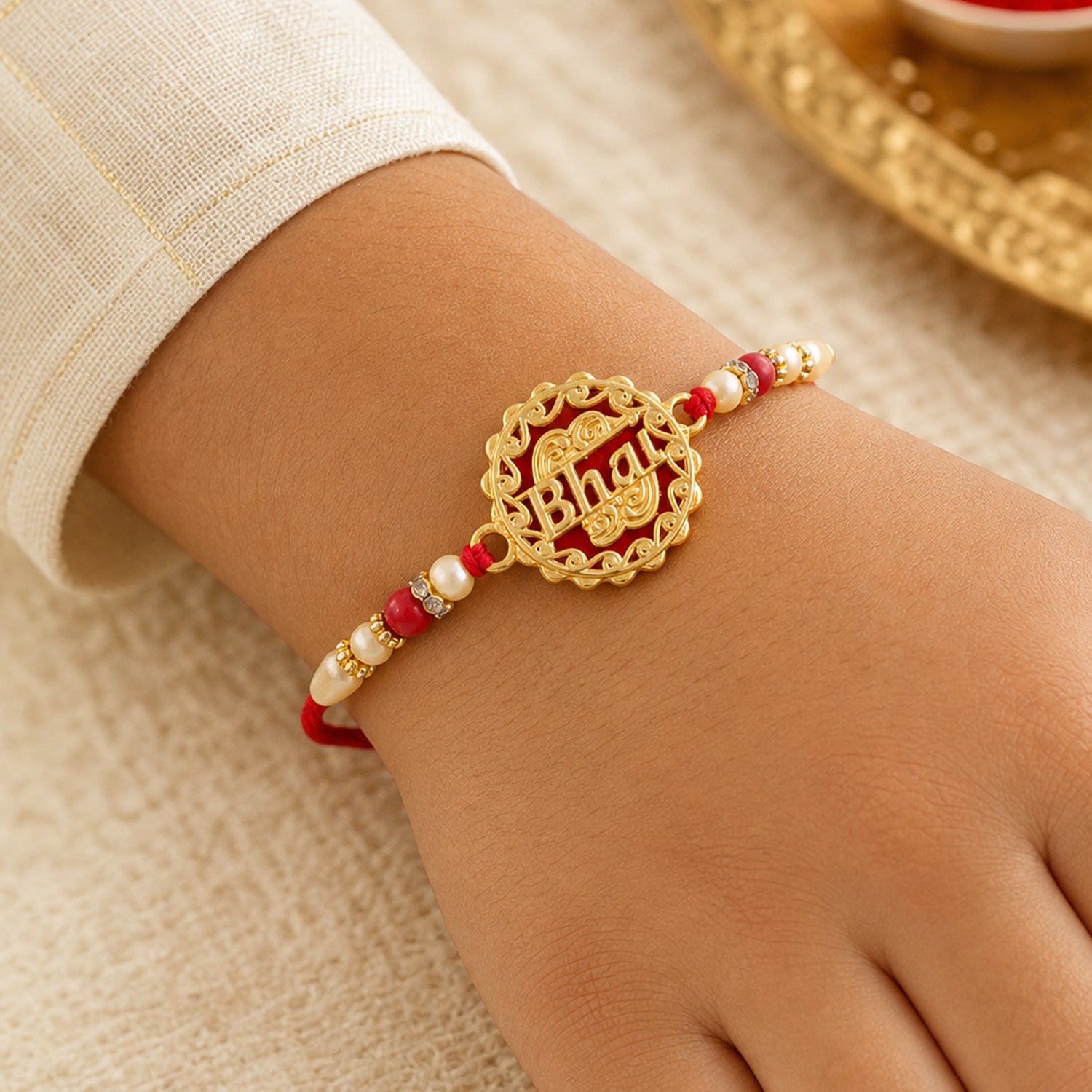 Swastik Rakhi – Golden Design with Red Beads & Thread