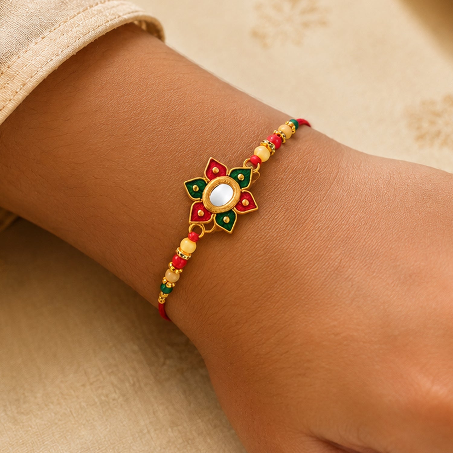 Floral Rakhi with Multicolor Stone Work – Elegant Raksha Bandhan Gift