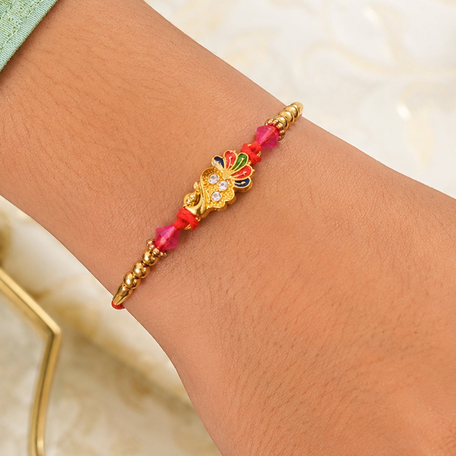Golden Peacock Charm Rakhi for Brother