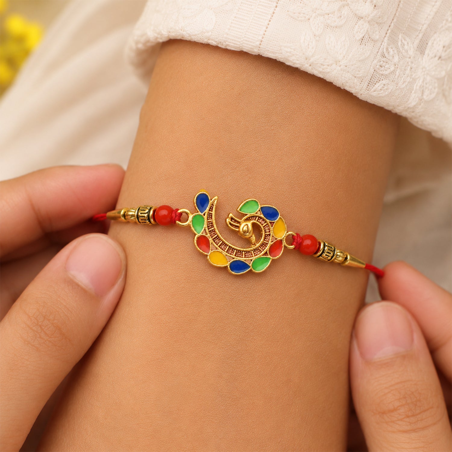 Peacock Rakhi, Elegant Symbol of Love for Brother close-up detail for festive gifting