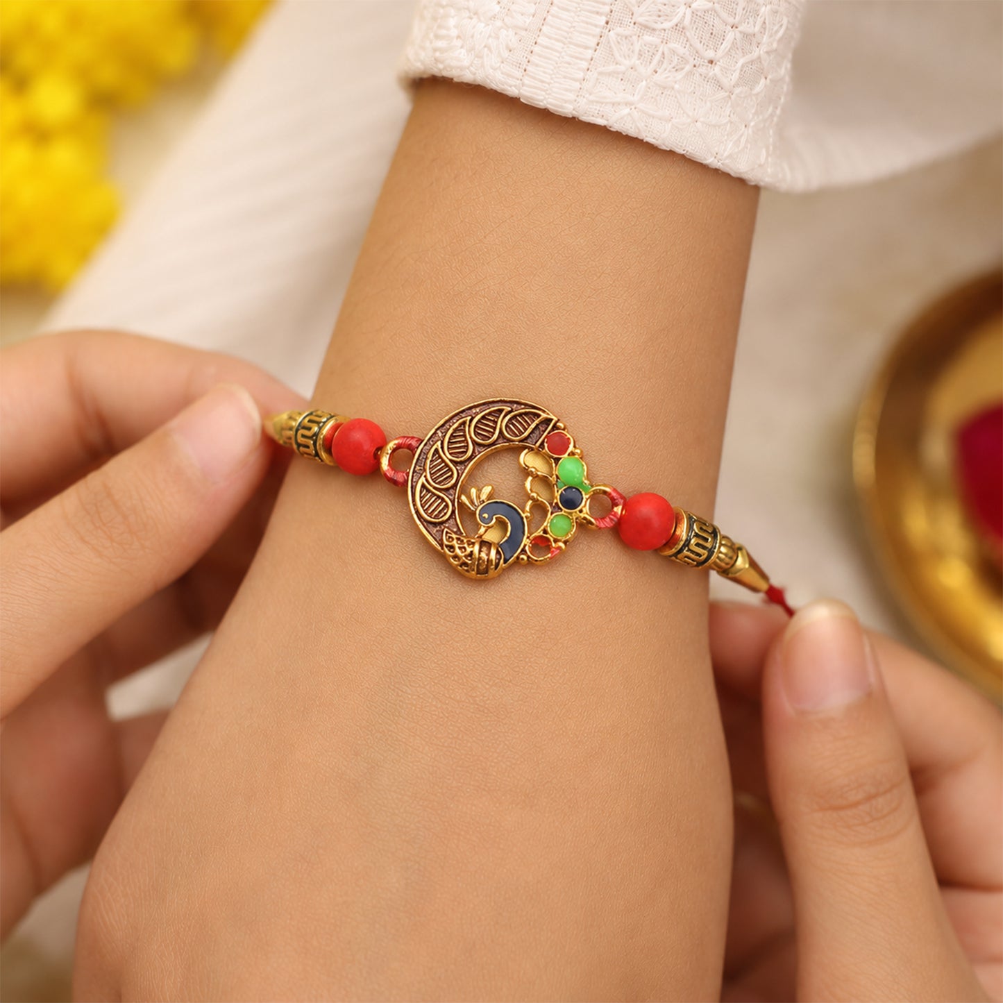 Peacock Design Rakhi, Elegant Round Traditional Rakhi side angle for festive gifting
