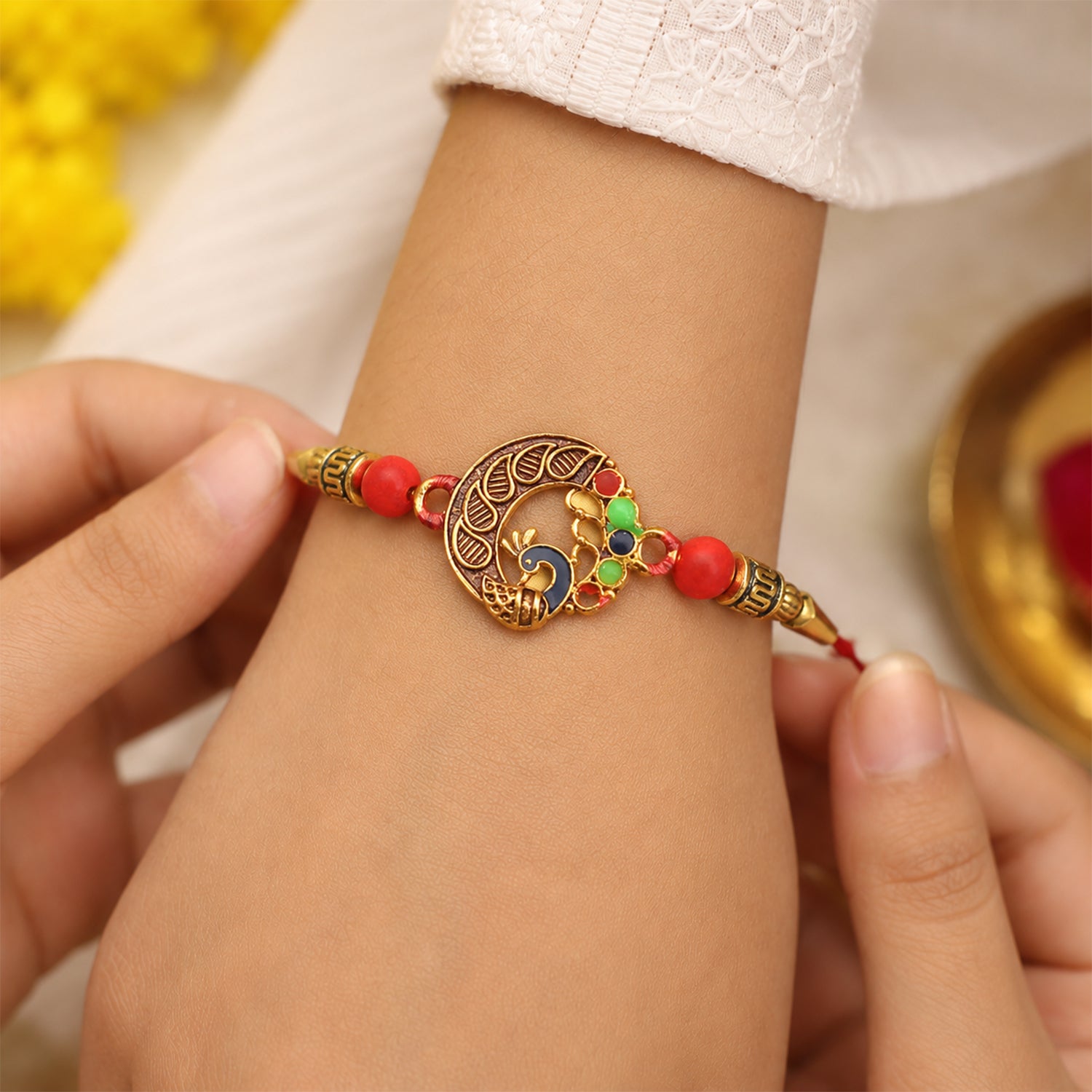 Peacock Design Rakhi, Elegant Round Traditional Rakhi side angle for festive gifting