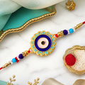 Evil Eye Rakhi – Stylish Beads with Golden Accents for Protection