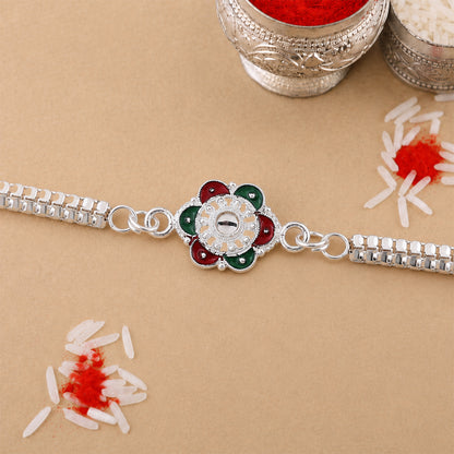 Flower Rakhi – Silver Finish with Mirror Stone for Brothers