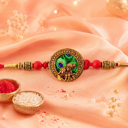 Krishna Rakhi – Traditional Peacock Feather Design with Beads