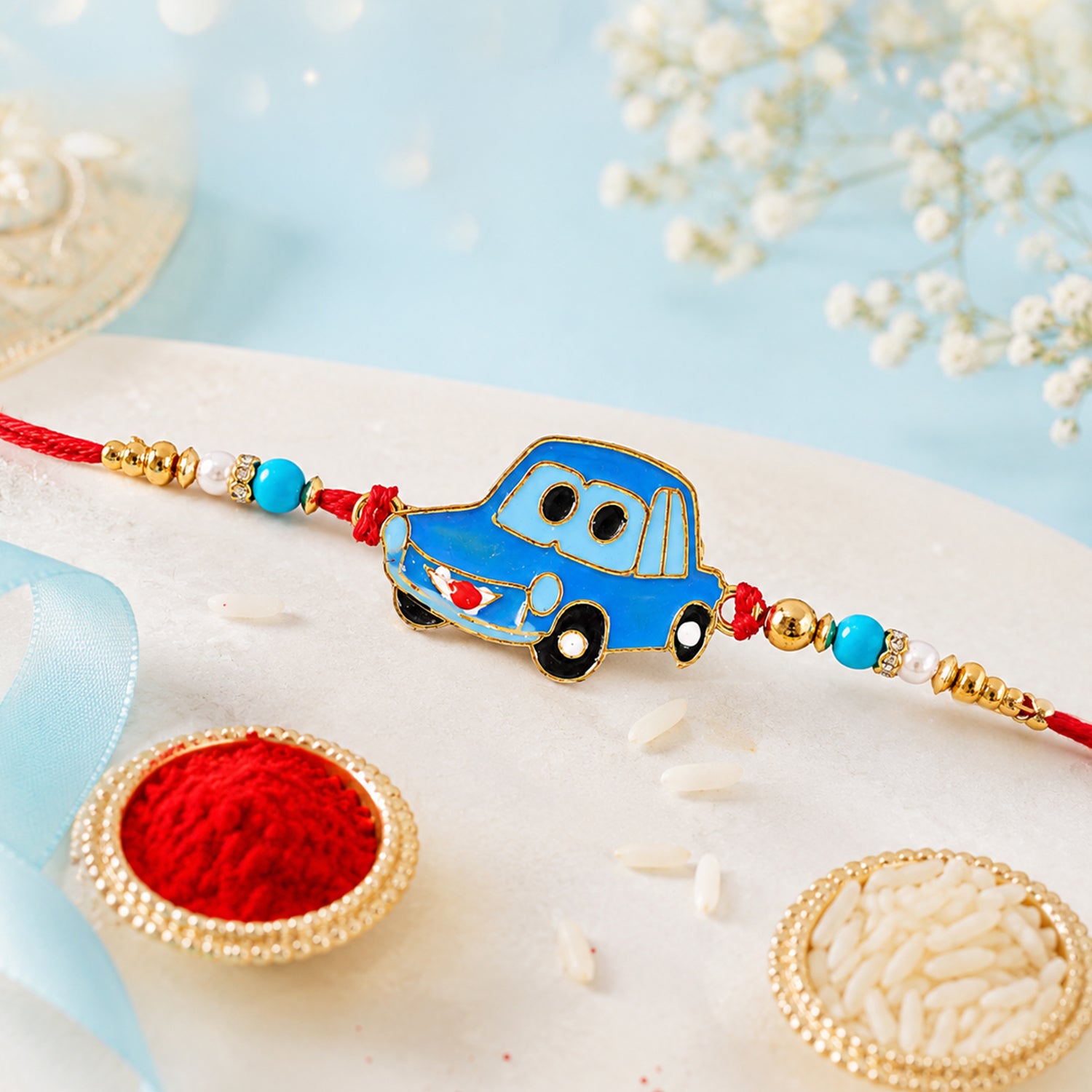 Kids Car Rakhi – Playful Design with Red Thread for Brothers