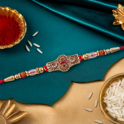 Rose Pink Kundan Stone Pendant Rakhi with Rudraksha and Coral Beads