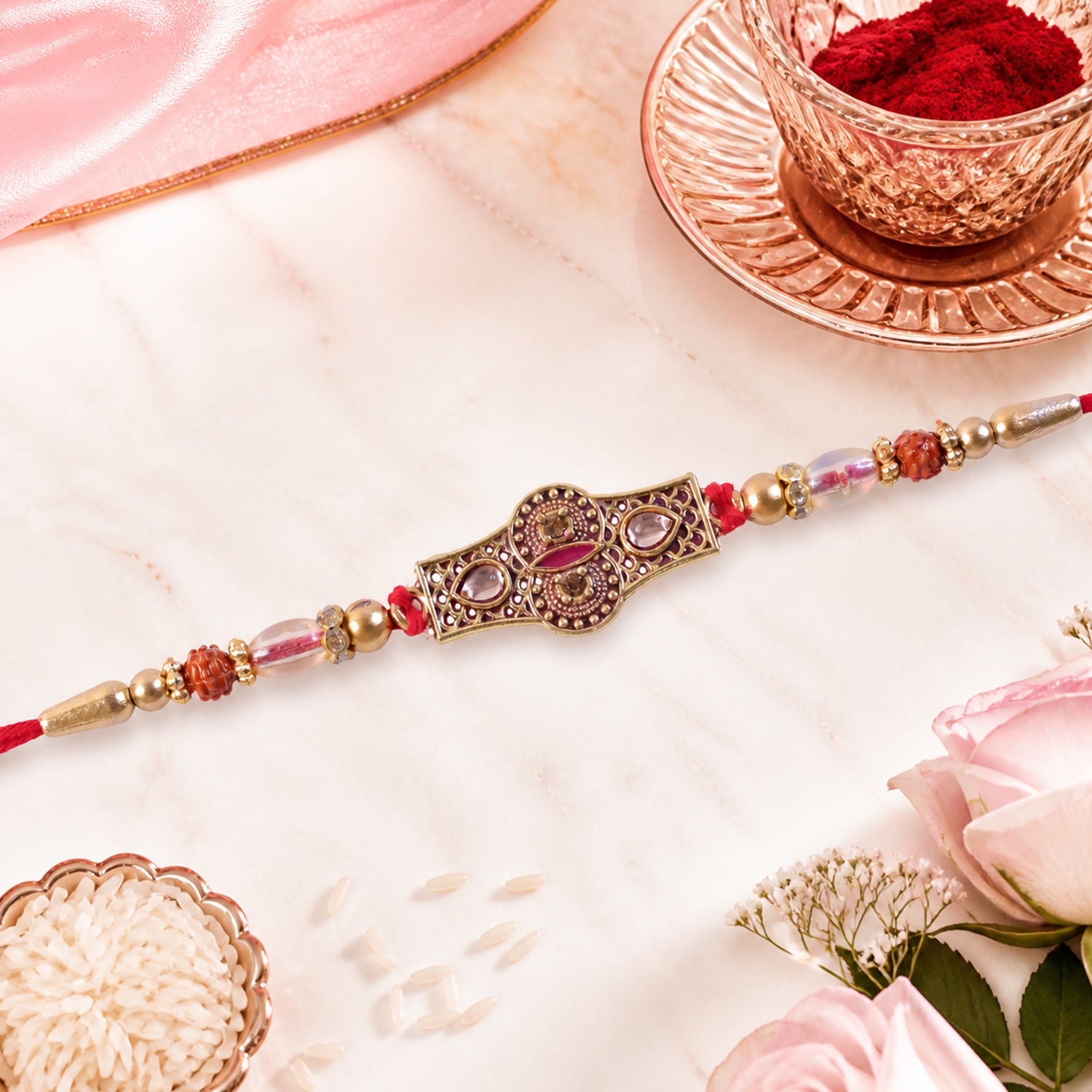 Rose Pink Kundan Stone Pendant Rakhi with Rudraksha and Coral Beads