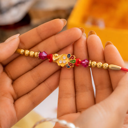 Golden Peacock Charm Rakhi for Brother