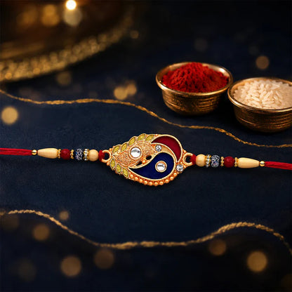 Elegant Enamel Rakhi, Paisley Design with Gold-Tone Embellishments