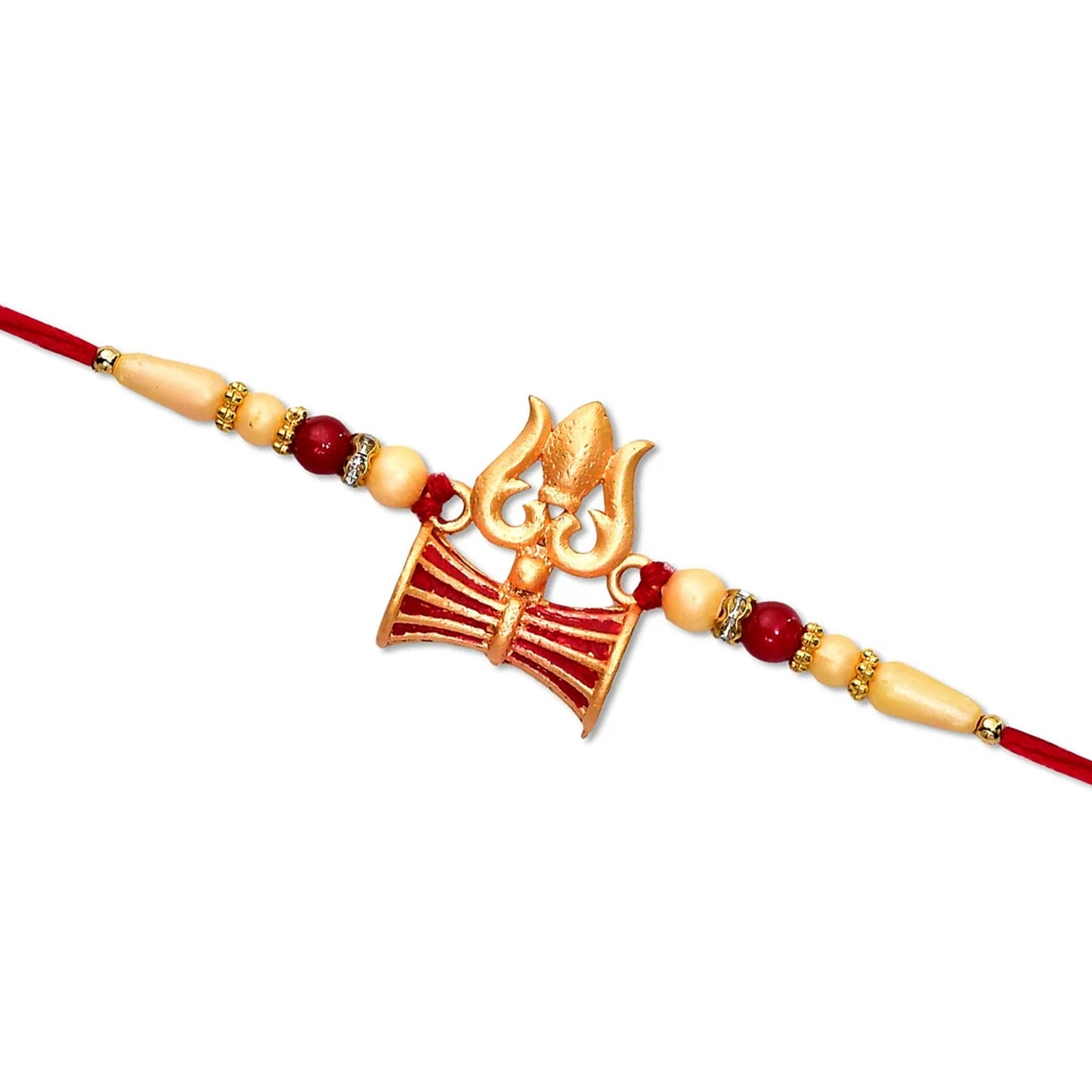 A gold Trishul and Damaru rakhi with red and cream beads on a red thread against a plain white background.