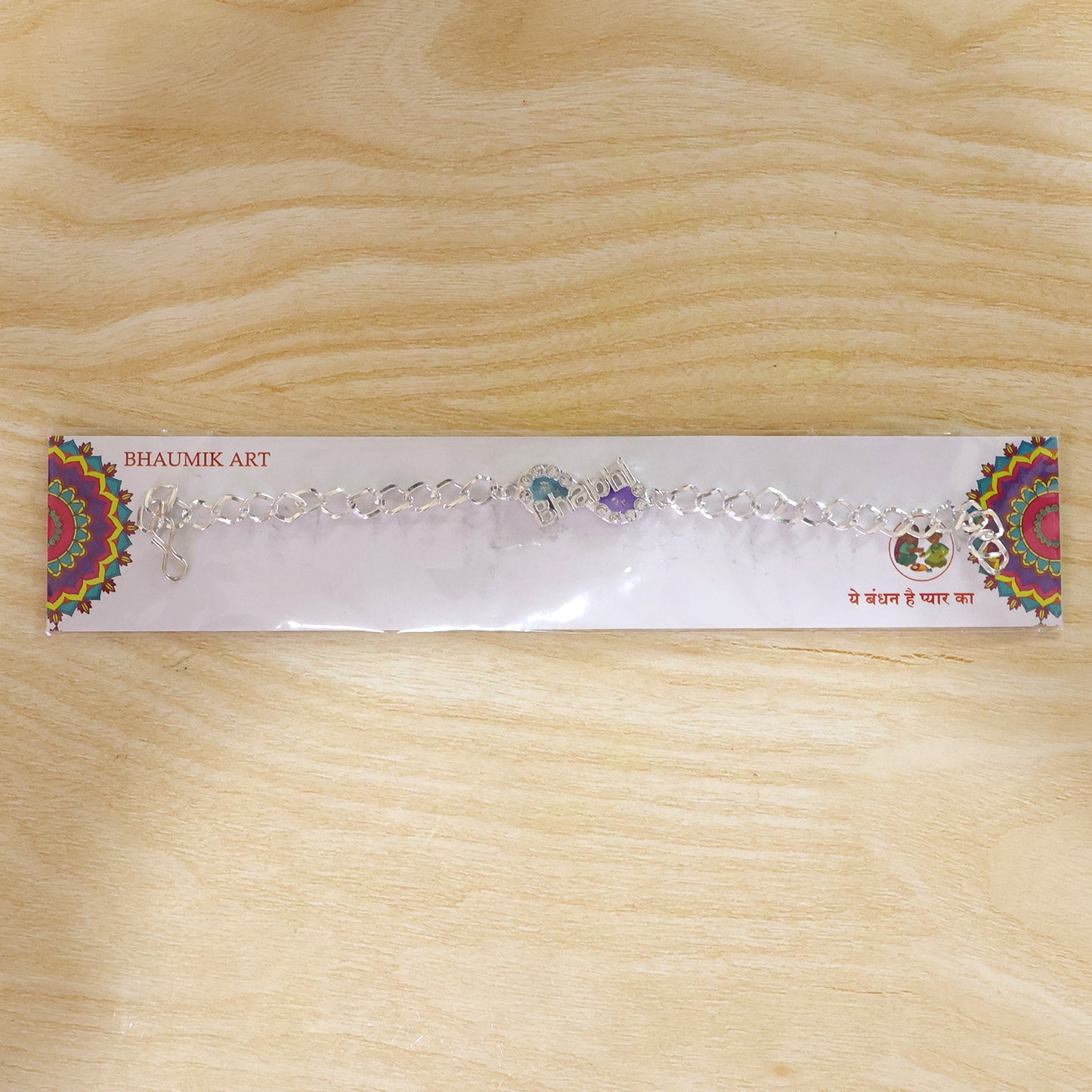 Arrangement of stone studded Bhai Rakhi showcasing various designs.