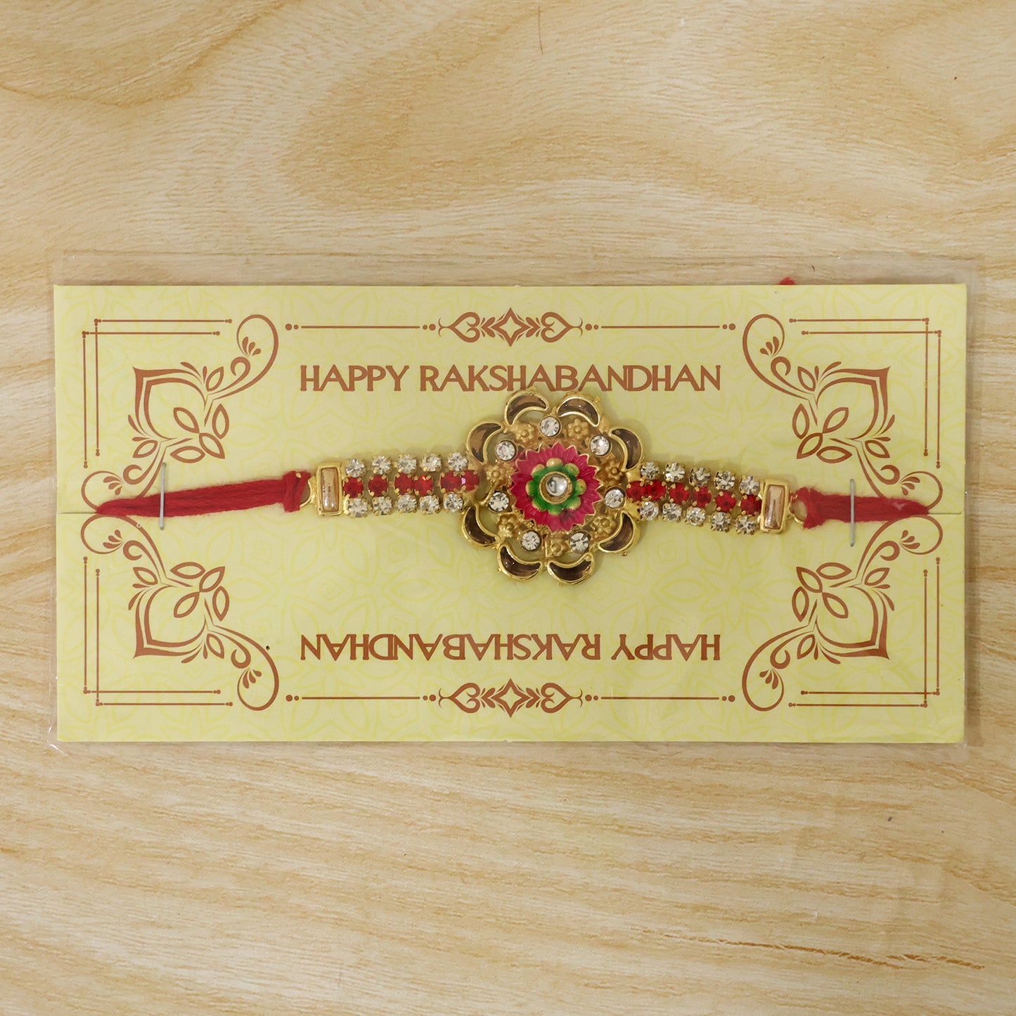 Diamond Rakhi – Stone Studded Floral Design with Colorful Enamel