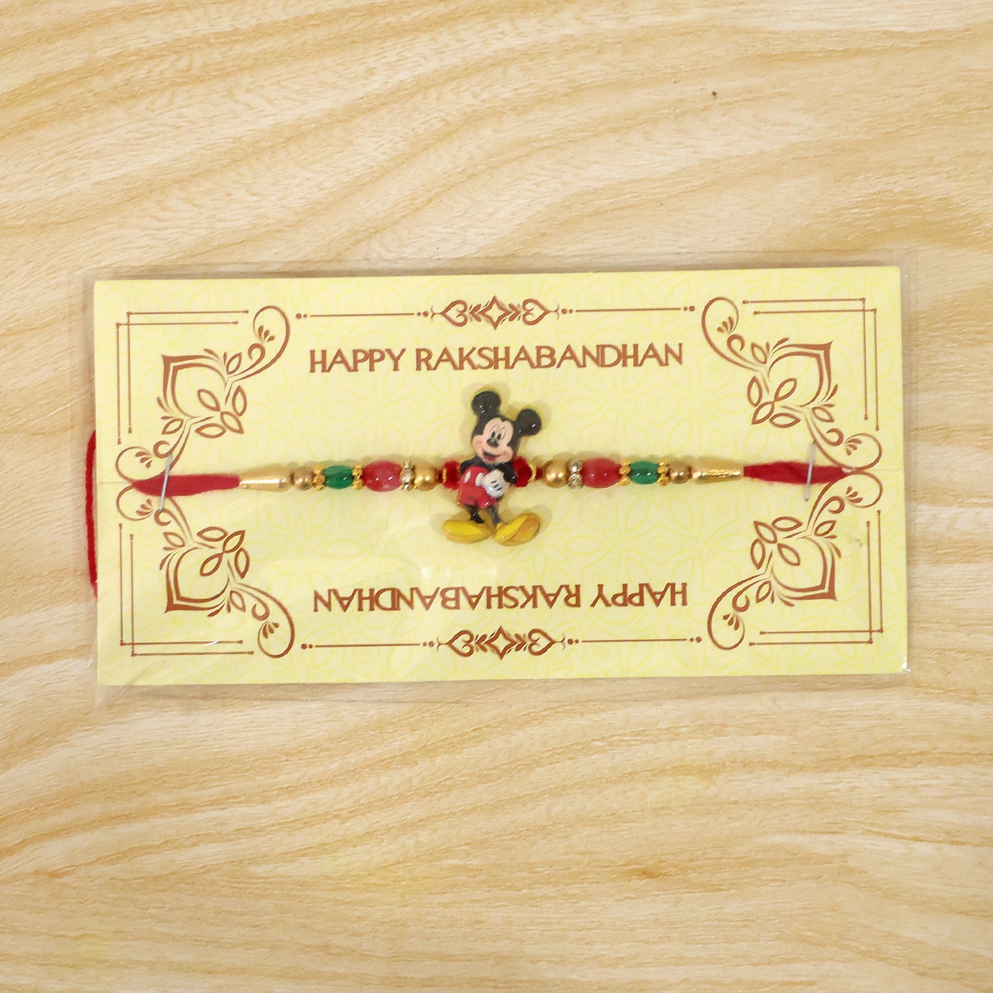 Mickey Mouse Rakhi with intricate pearl and bead detailing