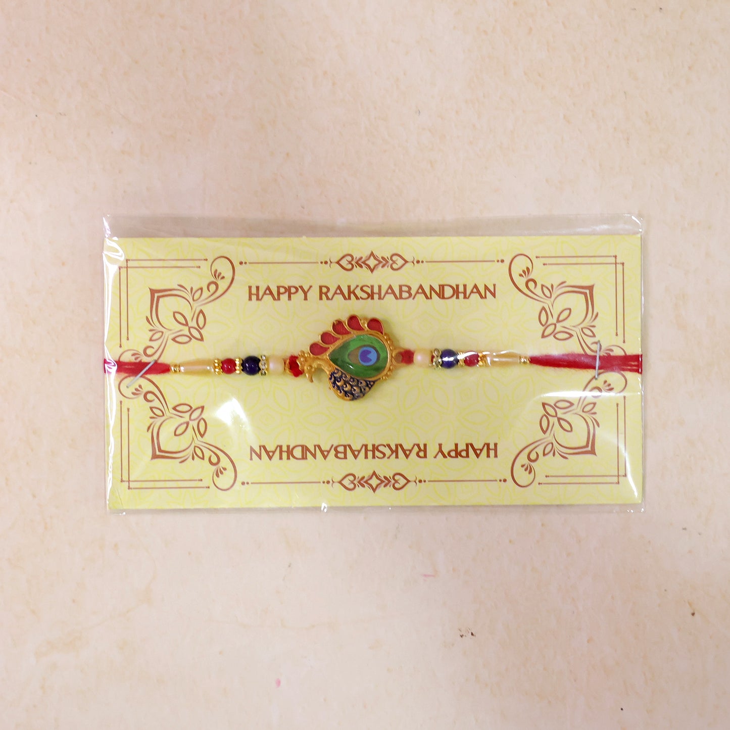 Golden Peacock Feather Enamel Pearl & Beads Rakhi for Brother