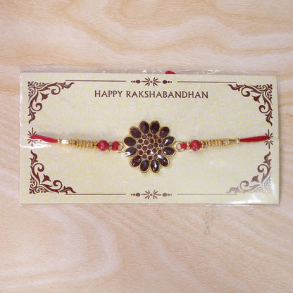 Red Floral Stone Rakhi with Bead Accents for Raksha Bandhan