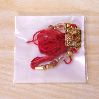 Antique Gold Kundan Studded Square Pendant Rakhi with Rudraksha Beads