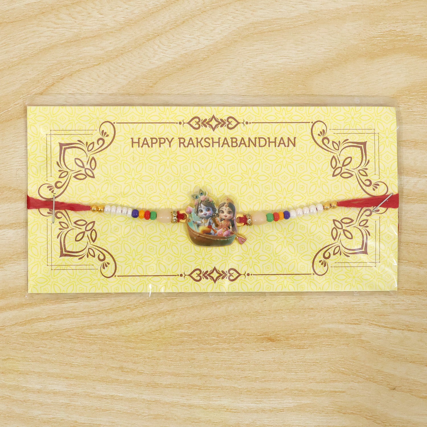 Packaging of the Lord Krishna Radha Rakhi, suitable for gifting during festivals. designer rakhi