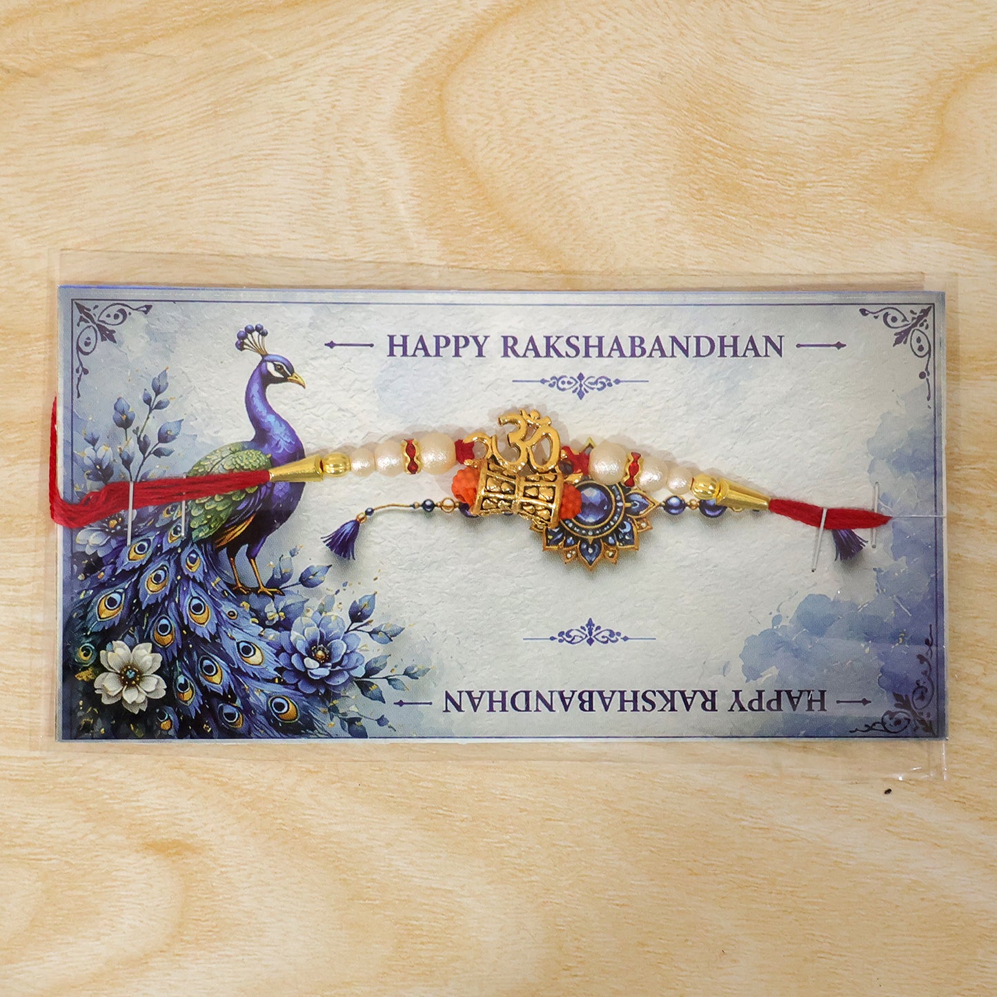 A collection of Golden Charm Rakhis, emphasizing the intricate design and pearl bead embellishments.