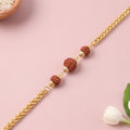 Rudraksha Bead Rakhi – Gold Plated Chain for Brother