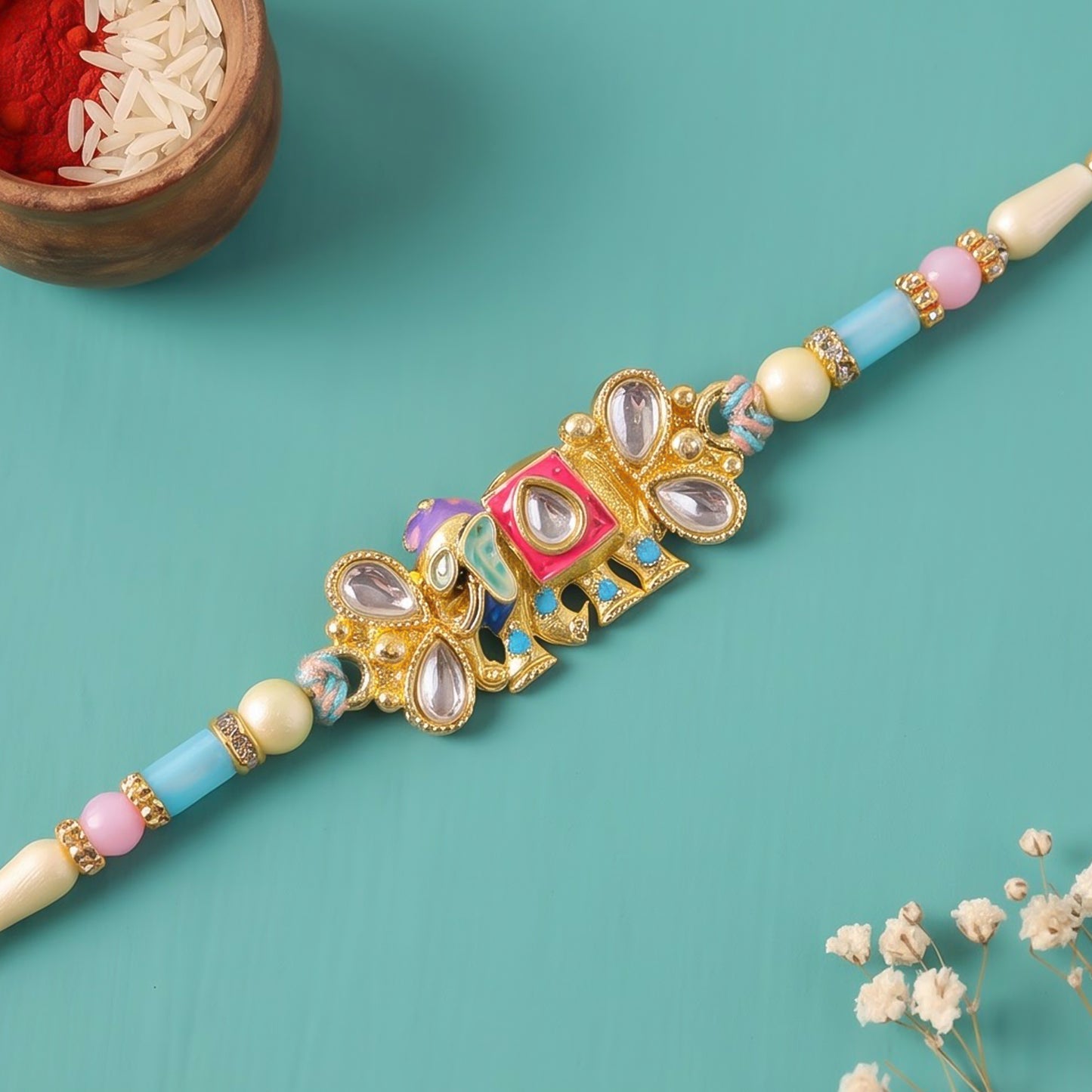Kundan Elephant Pendant Rakhi with Pastel Beads