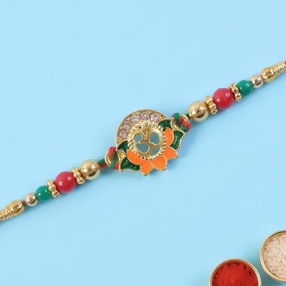Lotus Om Pendant Rakhi with Orange Petals and Kundan Stones