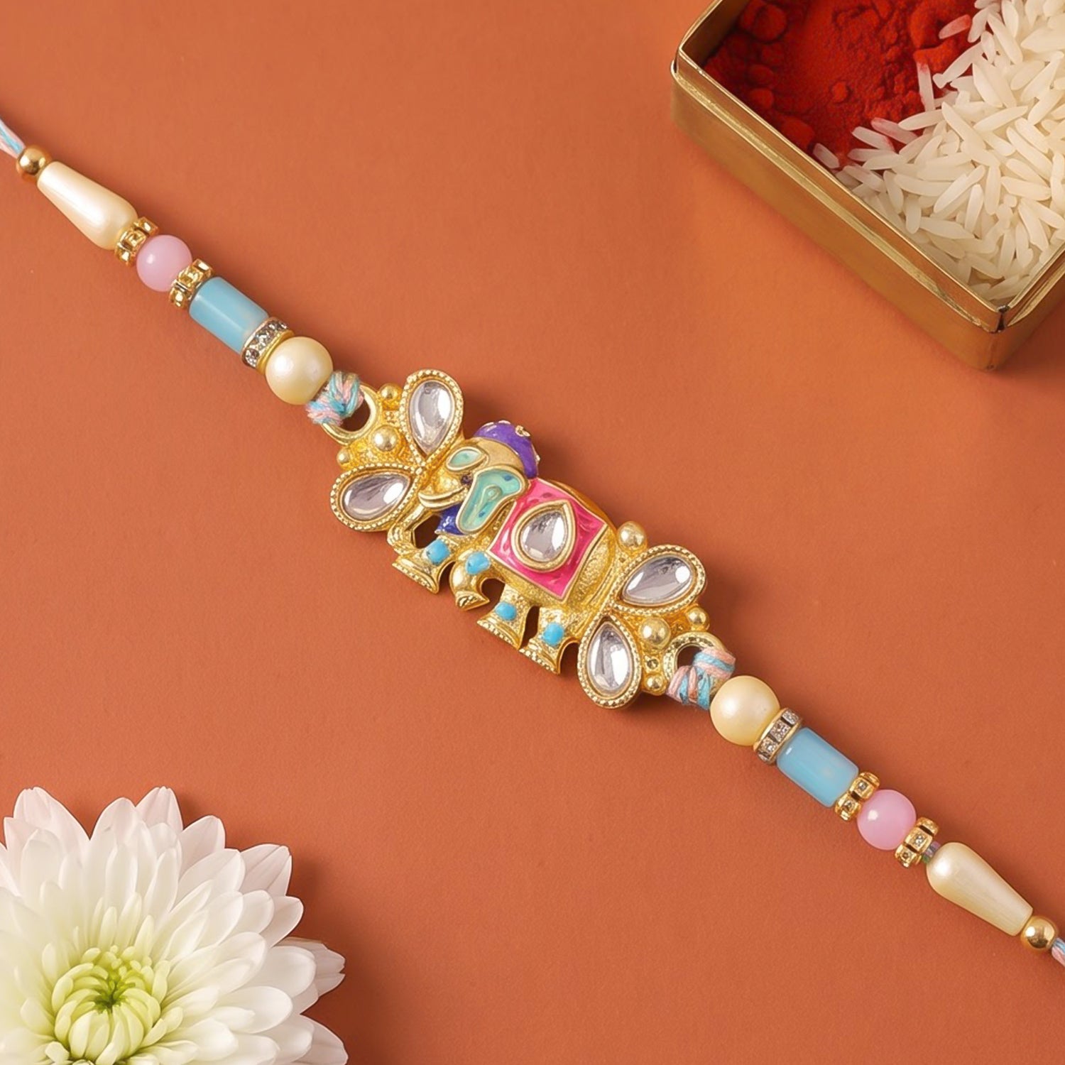 Kundan Elephant Pendant Rakhi with Pastel Beads