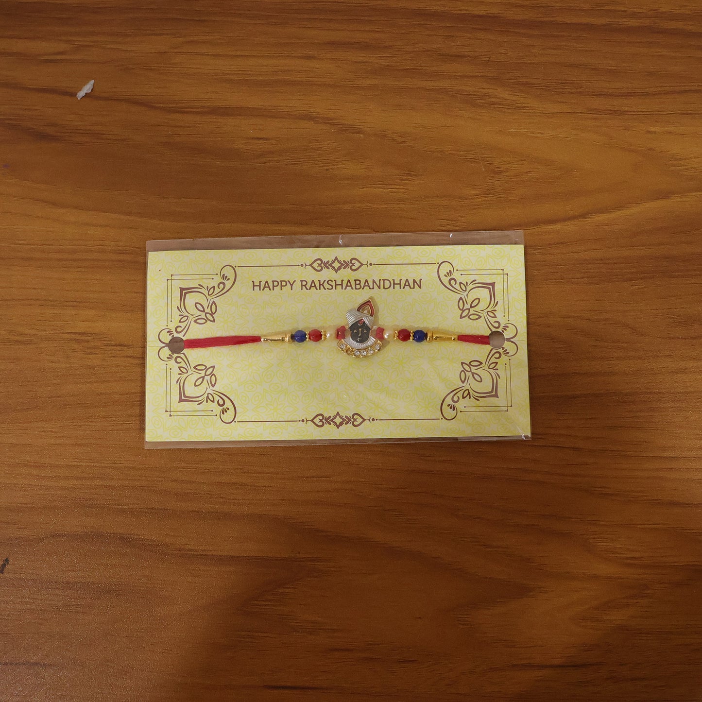Live view of Krishna design Rakhi with beads
