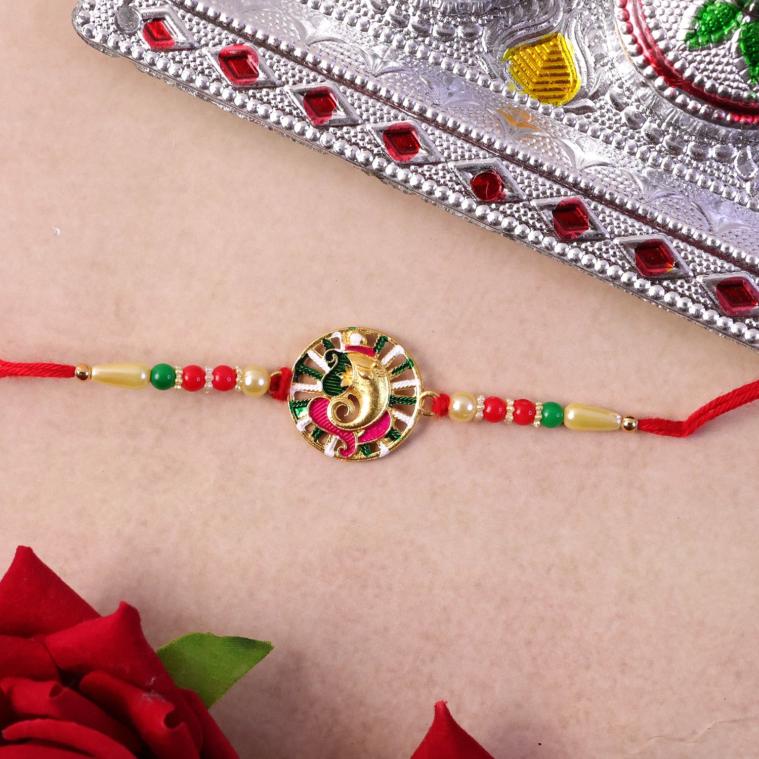 Side view of Premium Circular Ganesha Rakhi