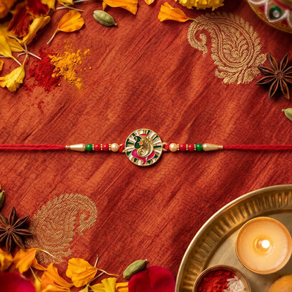 Artistic shot of Ganesha centerpiece on the rakhi