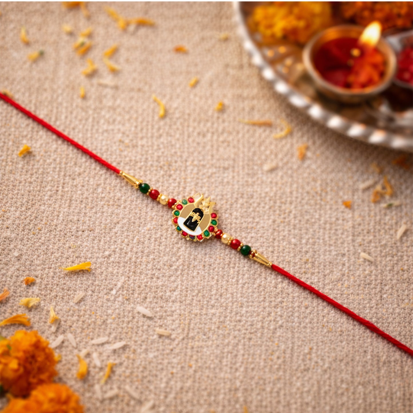 Colorful bead accents on Divine Shivling Rakhi
