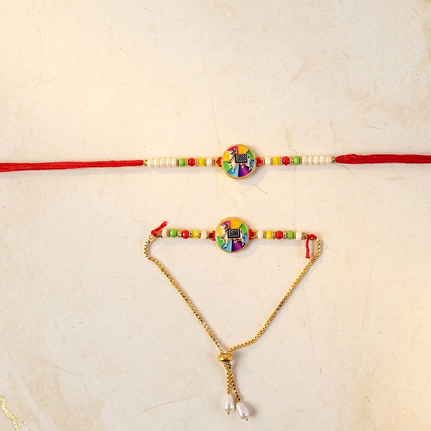 Traditional cow motif designer rakhi with intricate thread work