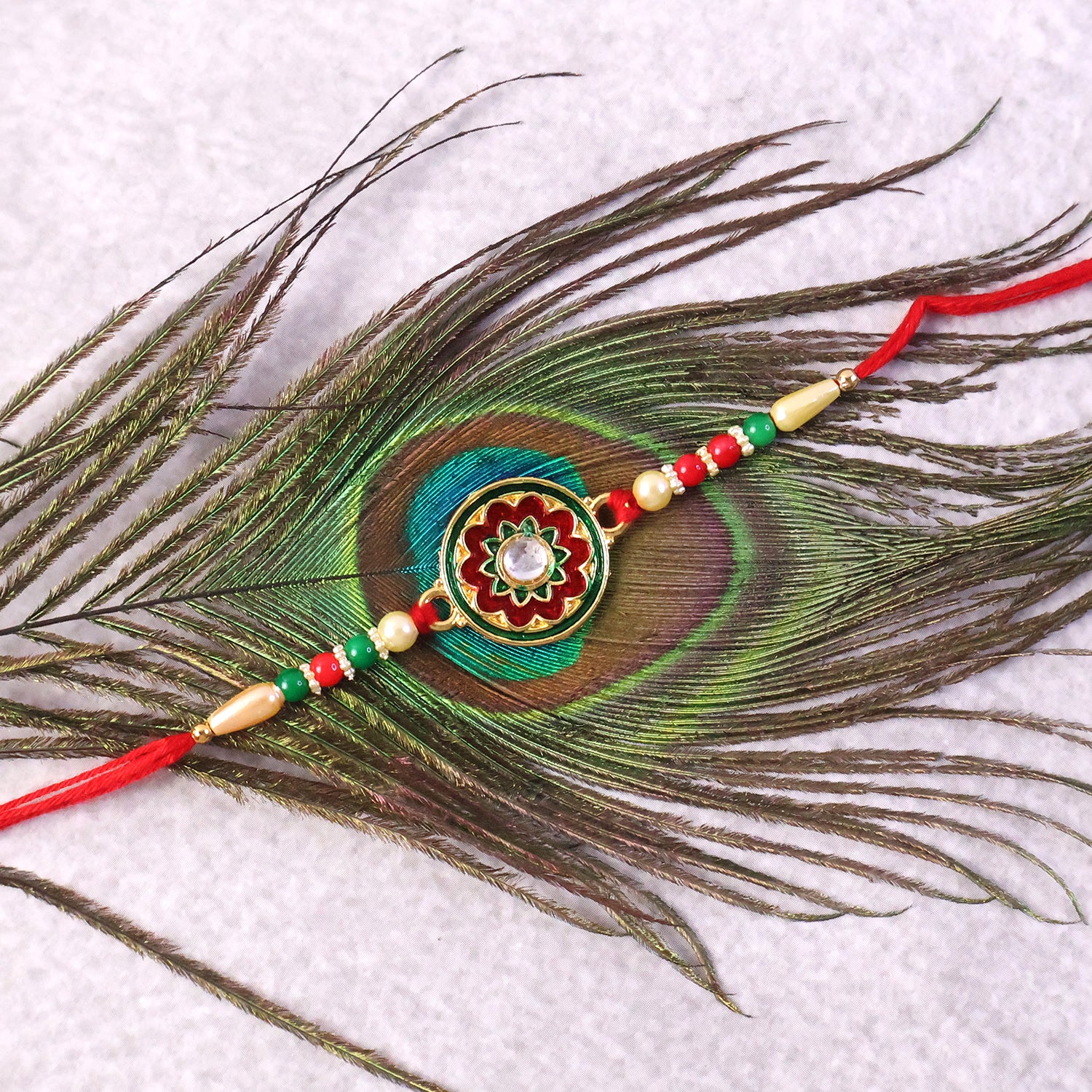 Decorative floral Rakhi on soft thread