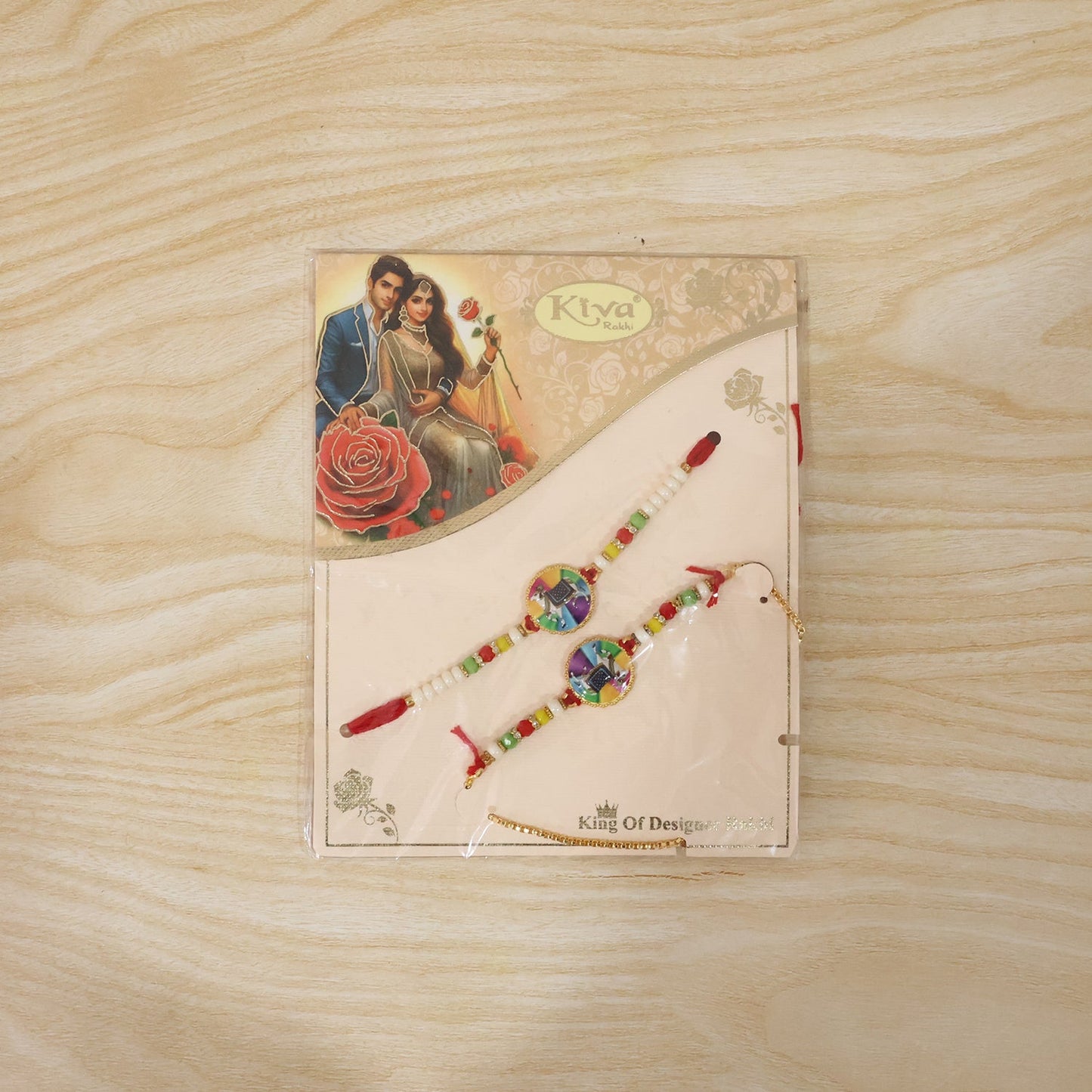 Traditional cow motif designer rakhi worn on wrist during celebration