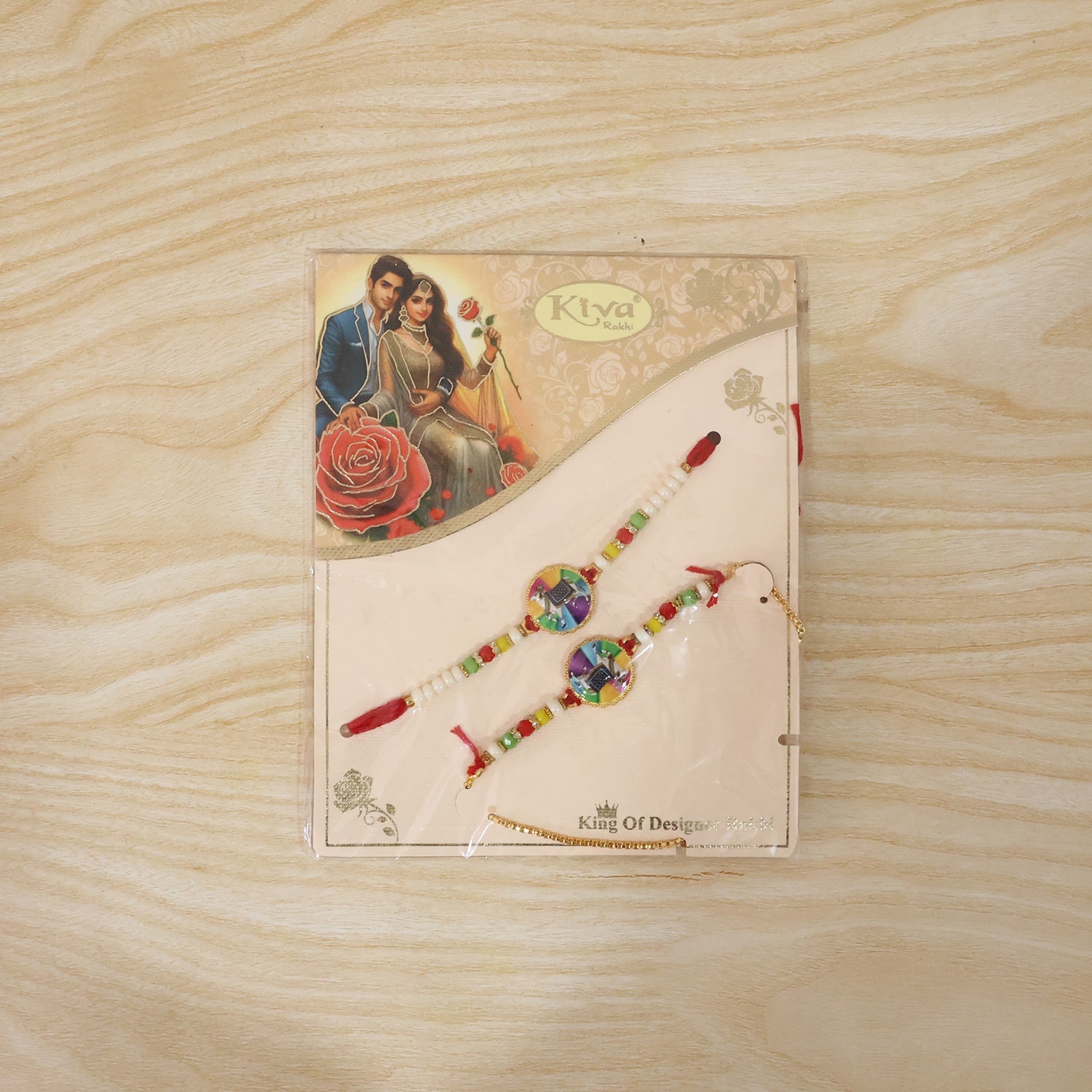 Traditional cow motif designer rakhi worn on wrist during celebration